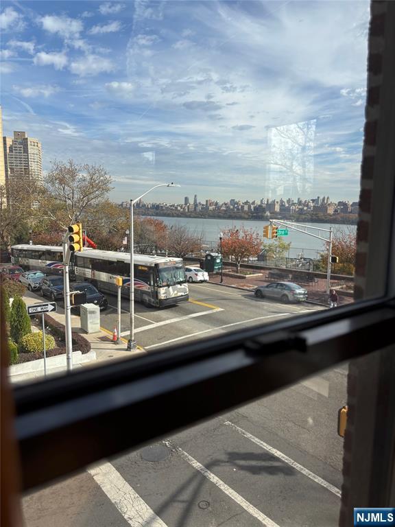 6209 Boulevard, Unit 1EN West New York, NJ 07093 - Photo 3 of 13 a view of a balcony next to a yard