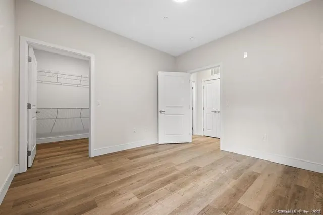 an aerial view of a balcony with many windows