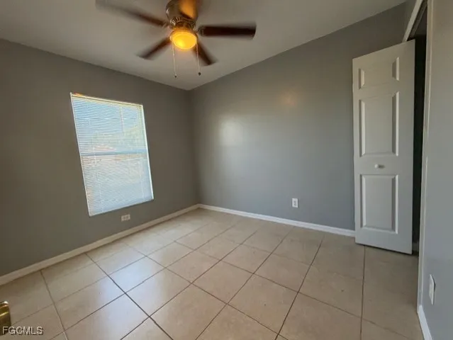 a view of an empty room and window