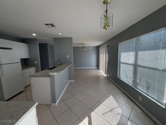 a view of a kitchen with a sink