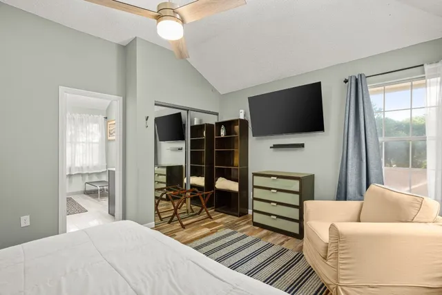 a bathroom with a shower and a toilet