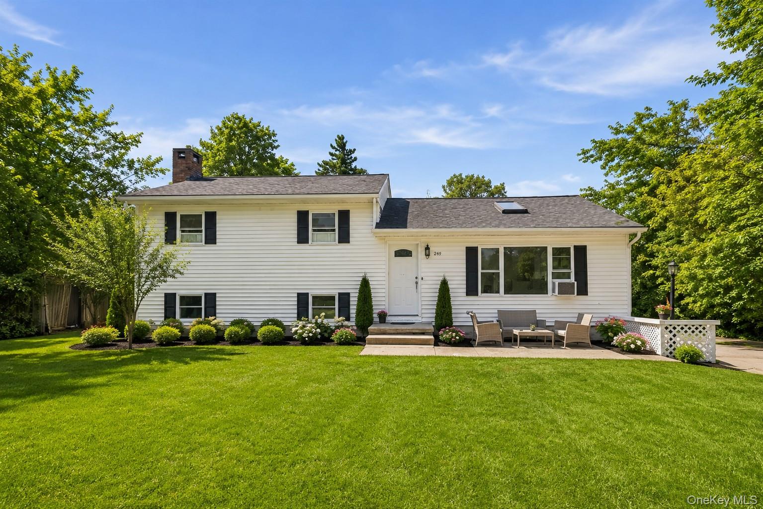 249 Ridge Road Highland Mills, NY 10930 - Photo 2 of 38 White siding exterior with black shutters and a black shingle roof