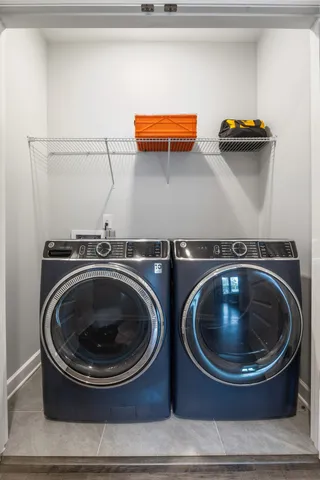 a utility room with dryer and washer