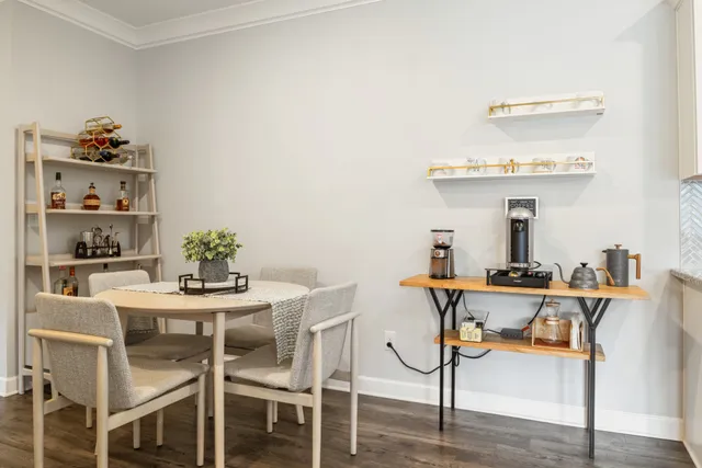 a view of a dining room with furniture
