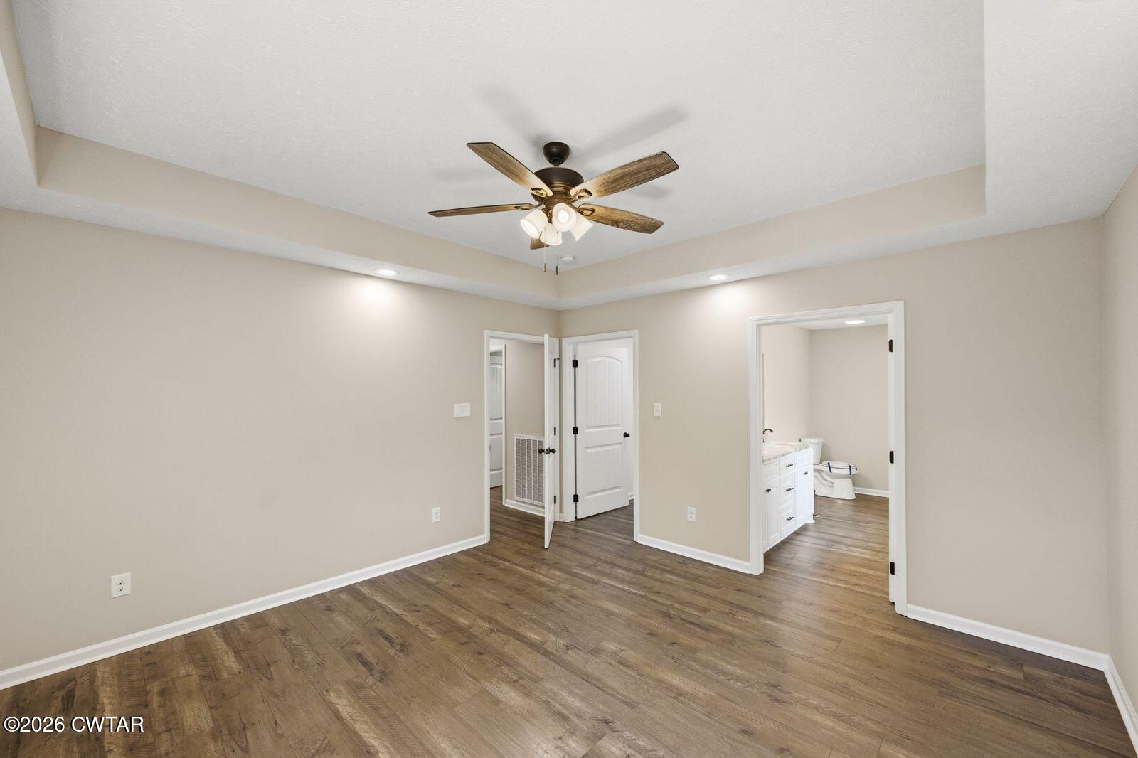 435 Old Huntingdon Road Lexington, TN 38351 - Photo 6 of 26 wooden floor in an empty room