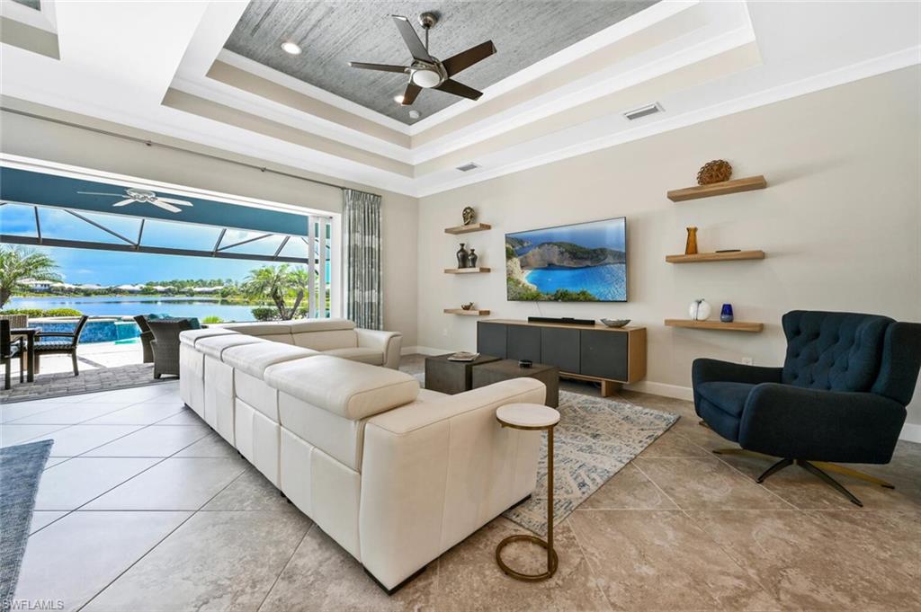 4909 Andros Drive Naples, FL 34113 - Photo 5 of 33 a living room with furniture and a large window