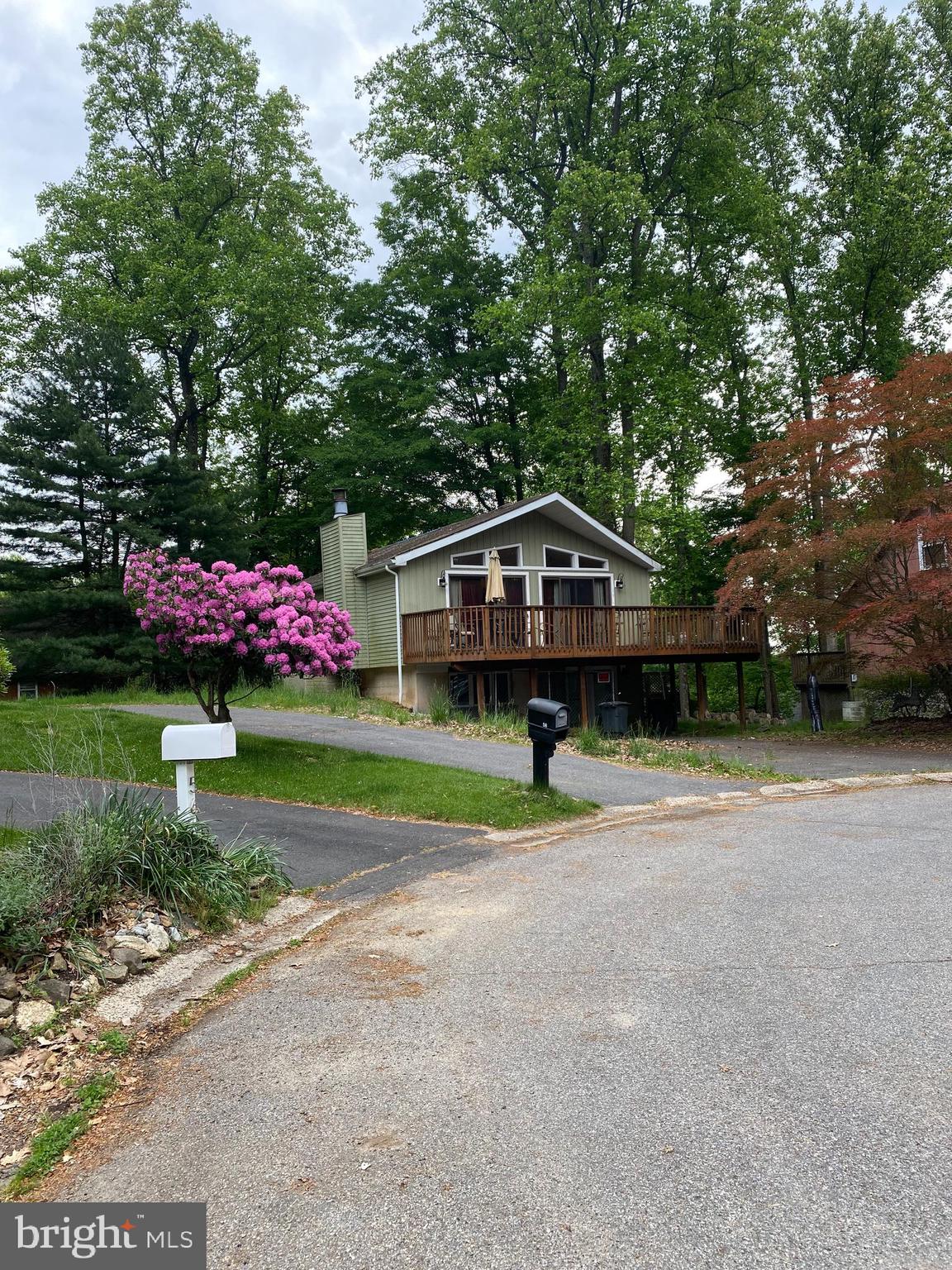 54 Mark Drive High Bridge, NJ 08829 - Photo 2 of 3 a house view with a garden space