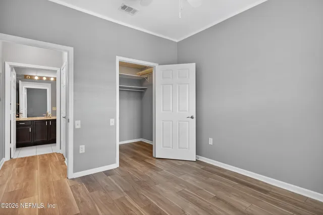 a view of a room with racks on the wall