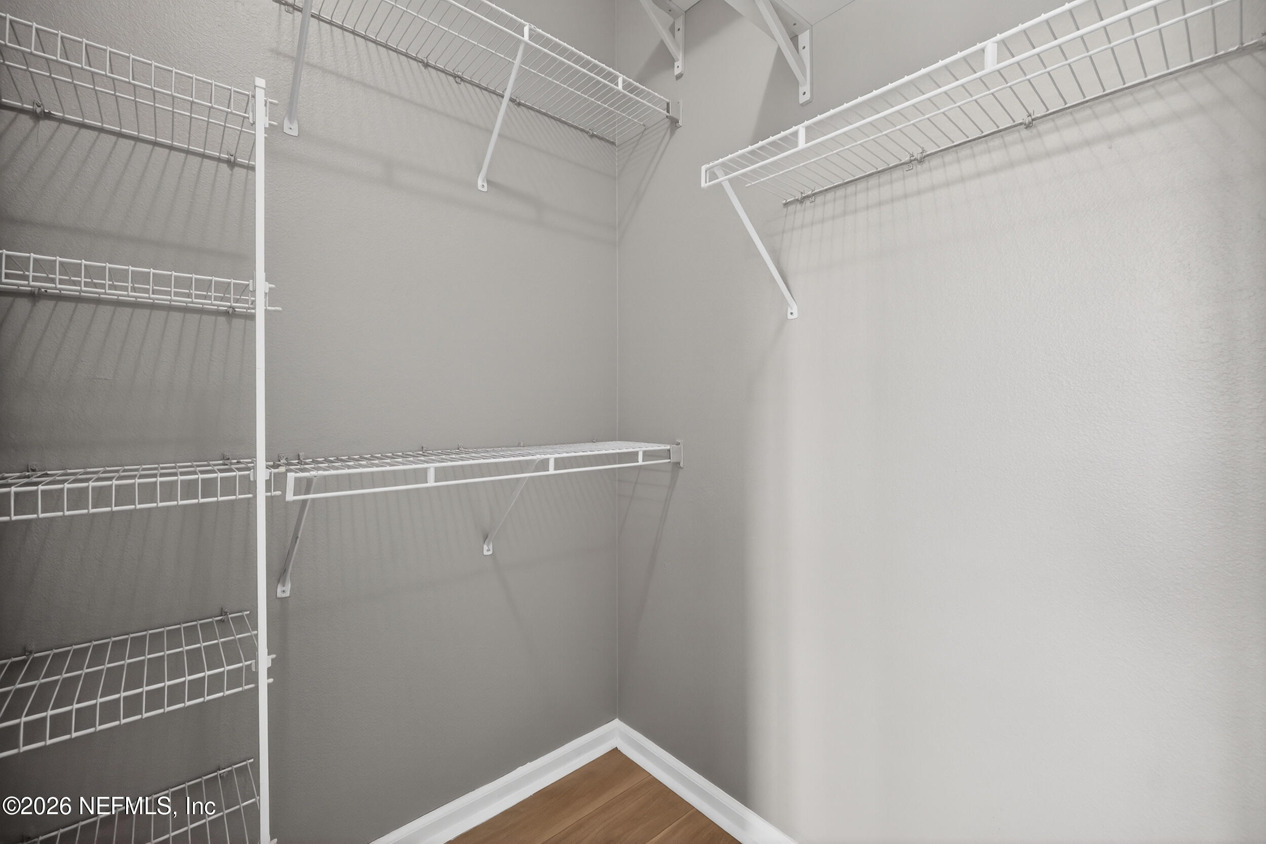 10550 Baymeadows Road, Unit 912 Jacksonville, FL 32256 - Photo 18 of 21 a view of a room with racks on the wall