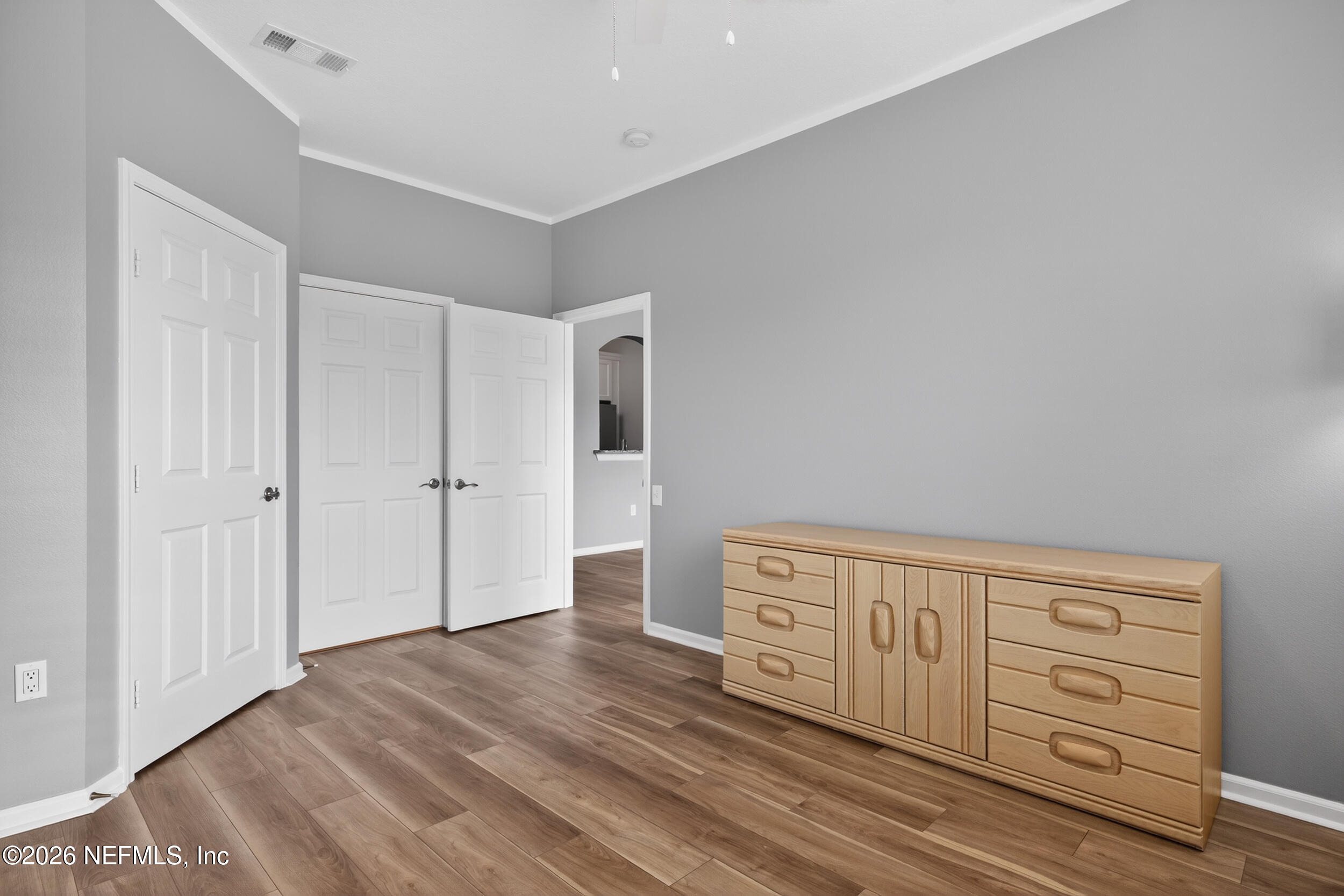 10550 Baymeadows Road, Unit 912 Jacksonville, FL 32256 - Photo 20 of 21 a view of a livingroom with wooden cabinets