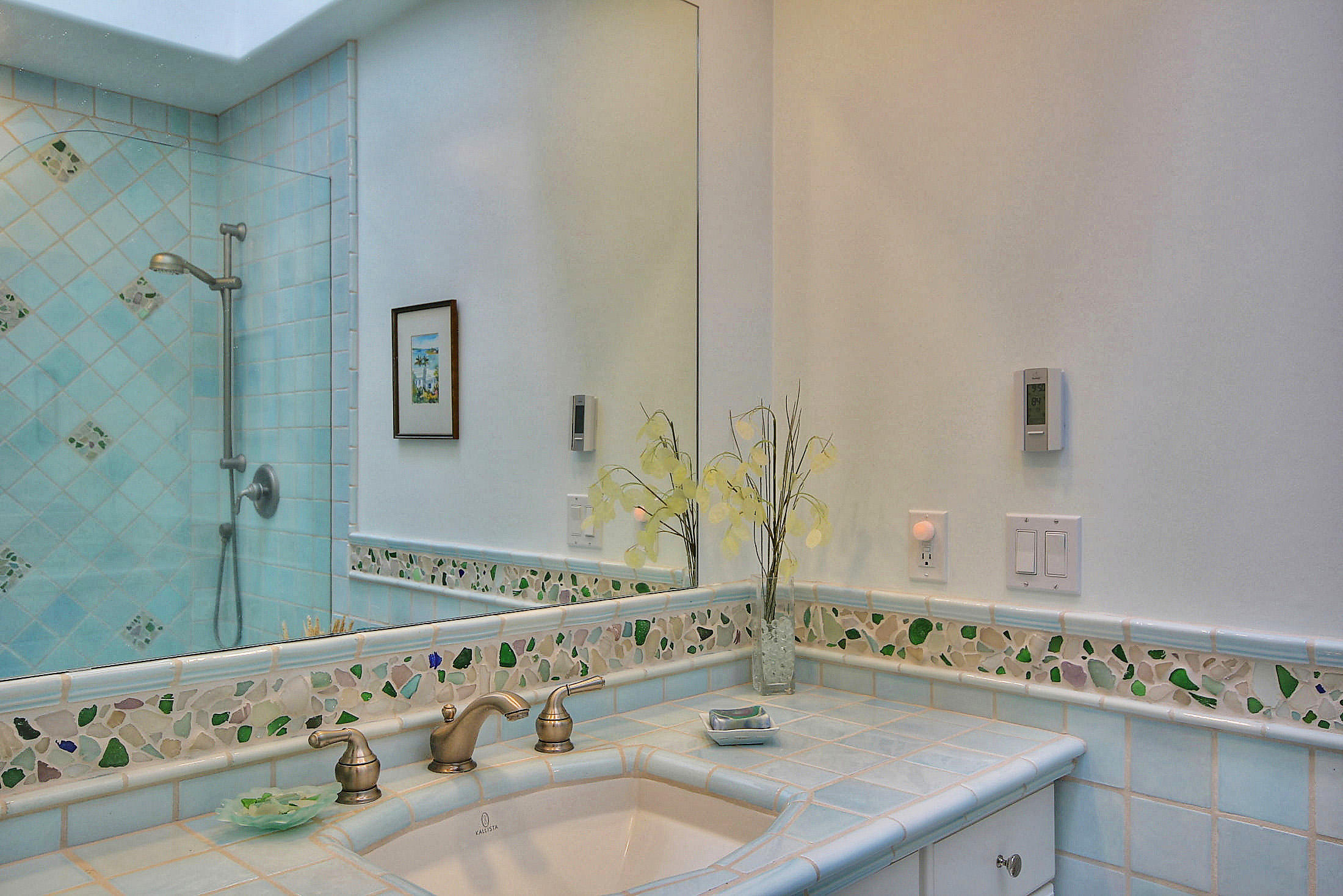 867 Via Abajo Santa Barbara, CA 93110 - Photo 18 of 26 a bathroom with a sink and a mirror