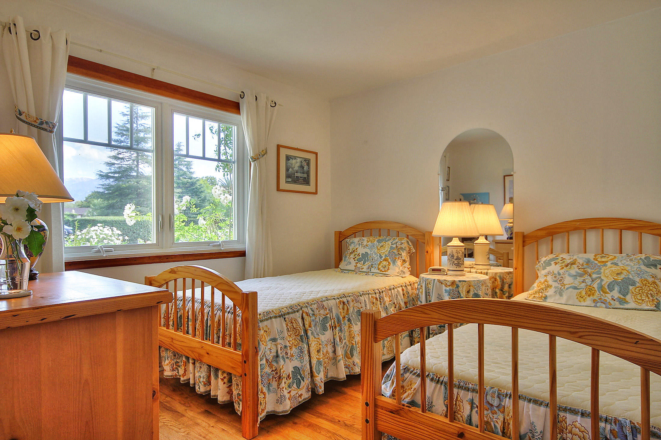 867 Via Abajo Santa Barbara, CA 93110 - Photo 21 of 26 a bedroom with furniture and a window