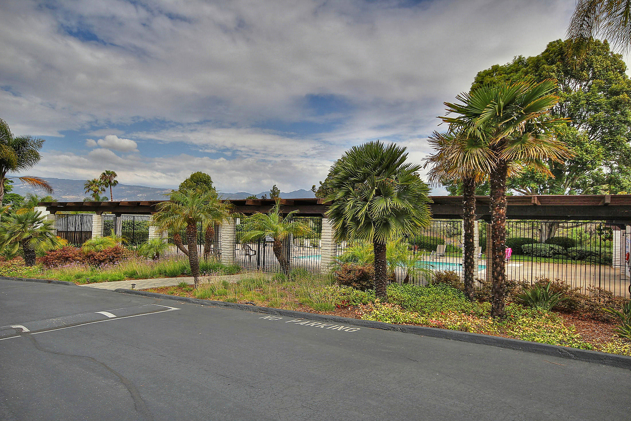 867 Via Abajo Santa Barbara, CA 93110 - Photo 25 of 26 a backyard of a house with table and chairs