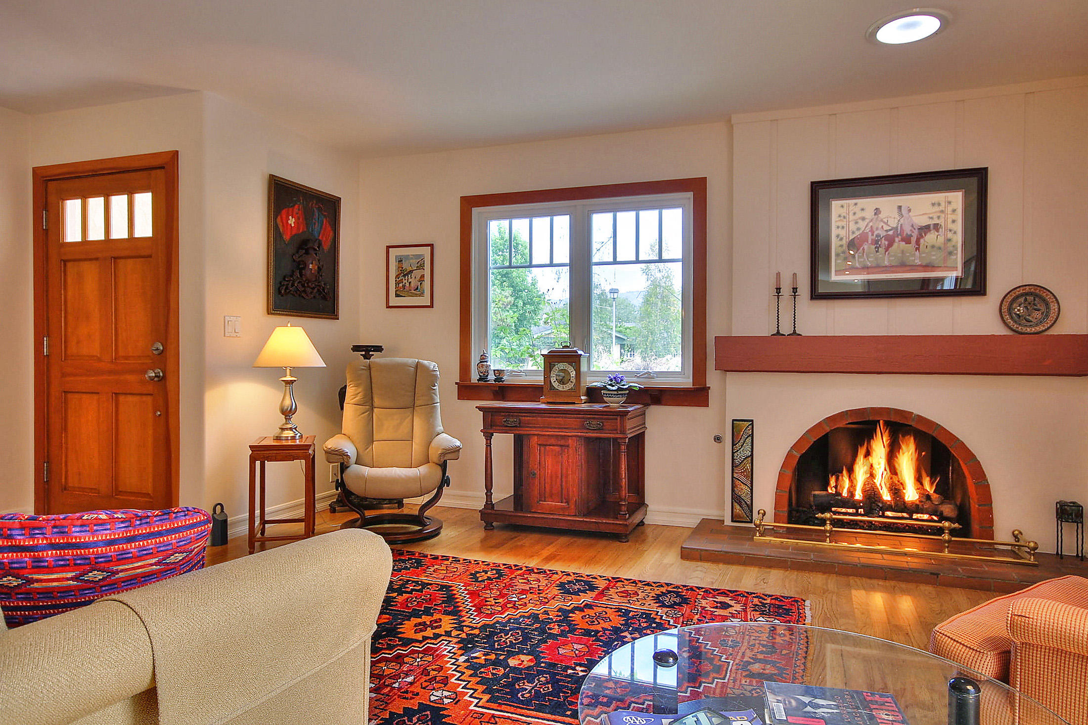 867 Via Abajo Santa Barbara, CA 93110 - Photo 4 of 26 a living room with furniture and a fireplace