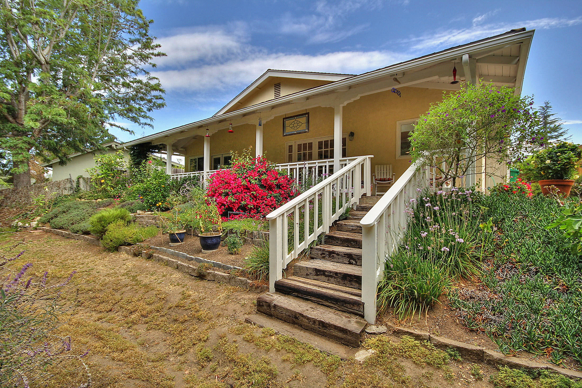 867 Via Abajo Santa Barbara, CA 93110 - Photo 10 of 26 a front view of a house with a yard