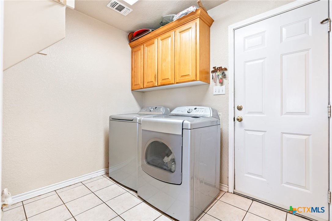155 Western Ridge Road Gatesville, TX 76528 - Photo 16 of 26 a utility room with dryer and washer