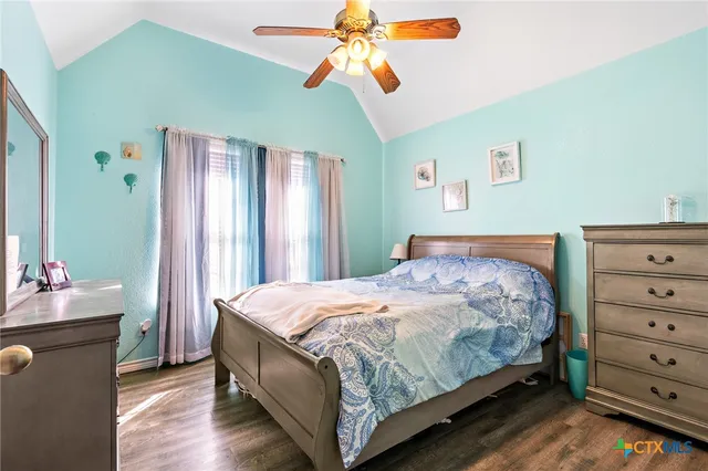 a bathroom with a sink a mirror and a bathtub