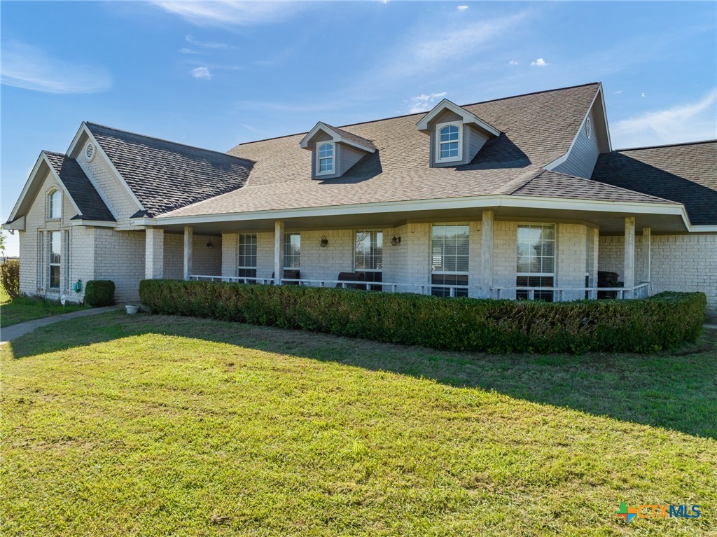 155 Western Ridge Road Gatesville, TX 76528 - Photo 2 of 26 a front view of a house with garden