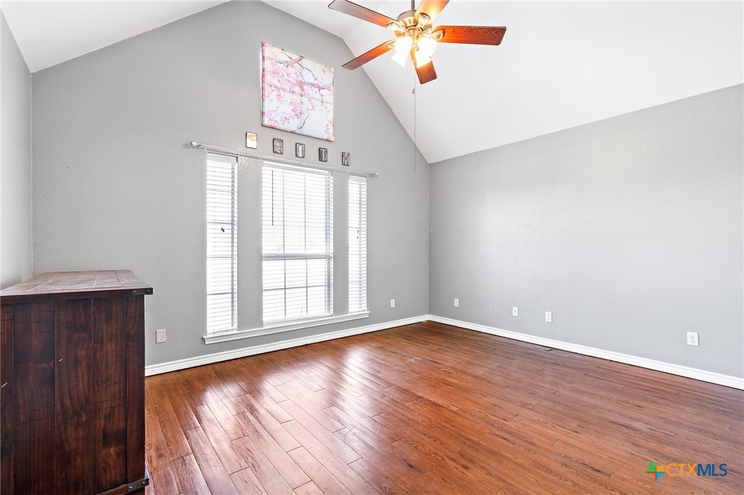 155 Western Ridge Road Gatesville, TX 76528 - Photo 24 of 26 wooden floor in an empty room with a window