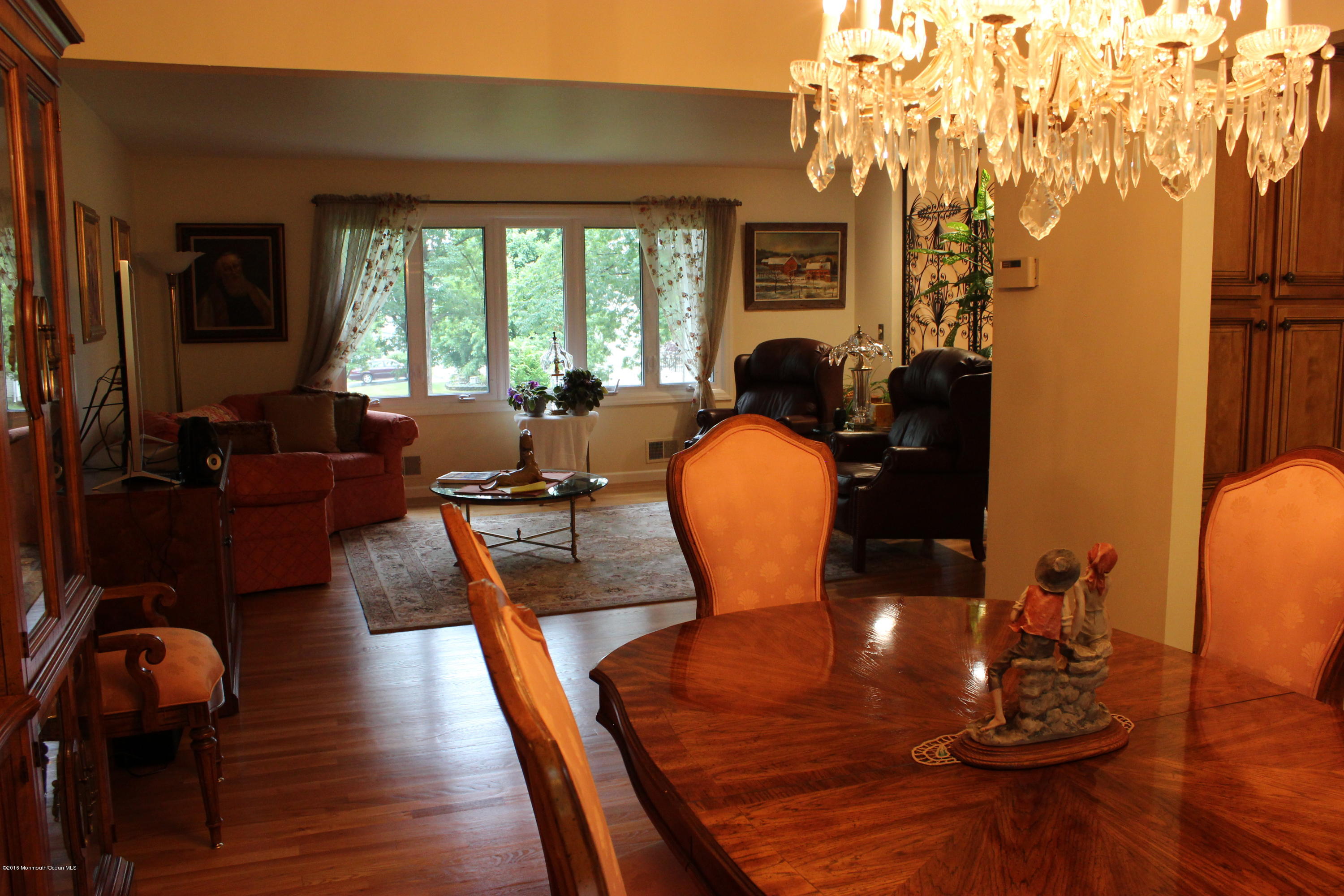3 Sunnyside Road Howell, NJ 07731 - Photo 9 of 28 a living room with furniture and wooden floor