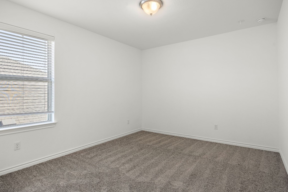 1817 Turtle Bay Loop Leander, TX 78641 - Photo 18 of 38 an empty room with a window