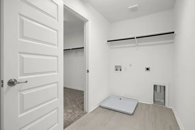 a view of an empty walk in closet