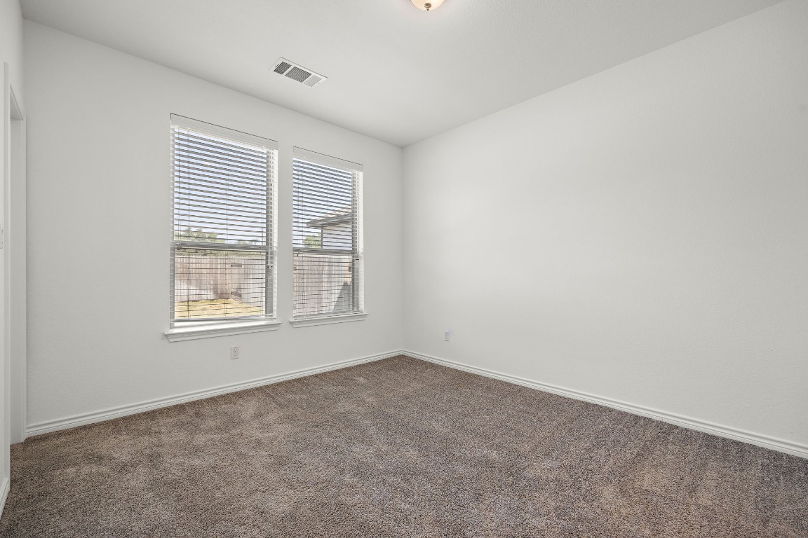 1817 Turtle Bay Loop Leander, TX 78641 - Photo 30 of 38 an empty room with a window
