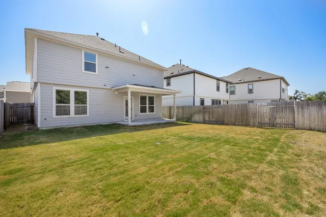 a view of a house with a swimming pool