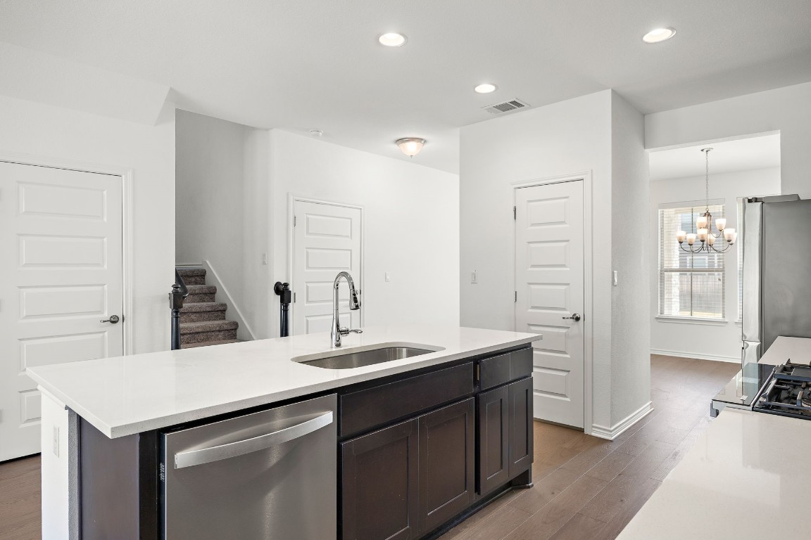 1817 Turtle Bay Loop Leander, TX 78641 - Photo 7 of 38 a bathroom with a sink double vanity and a mirror