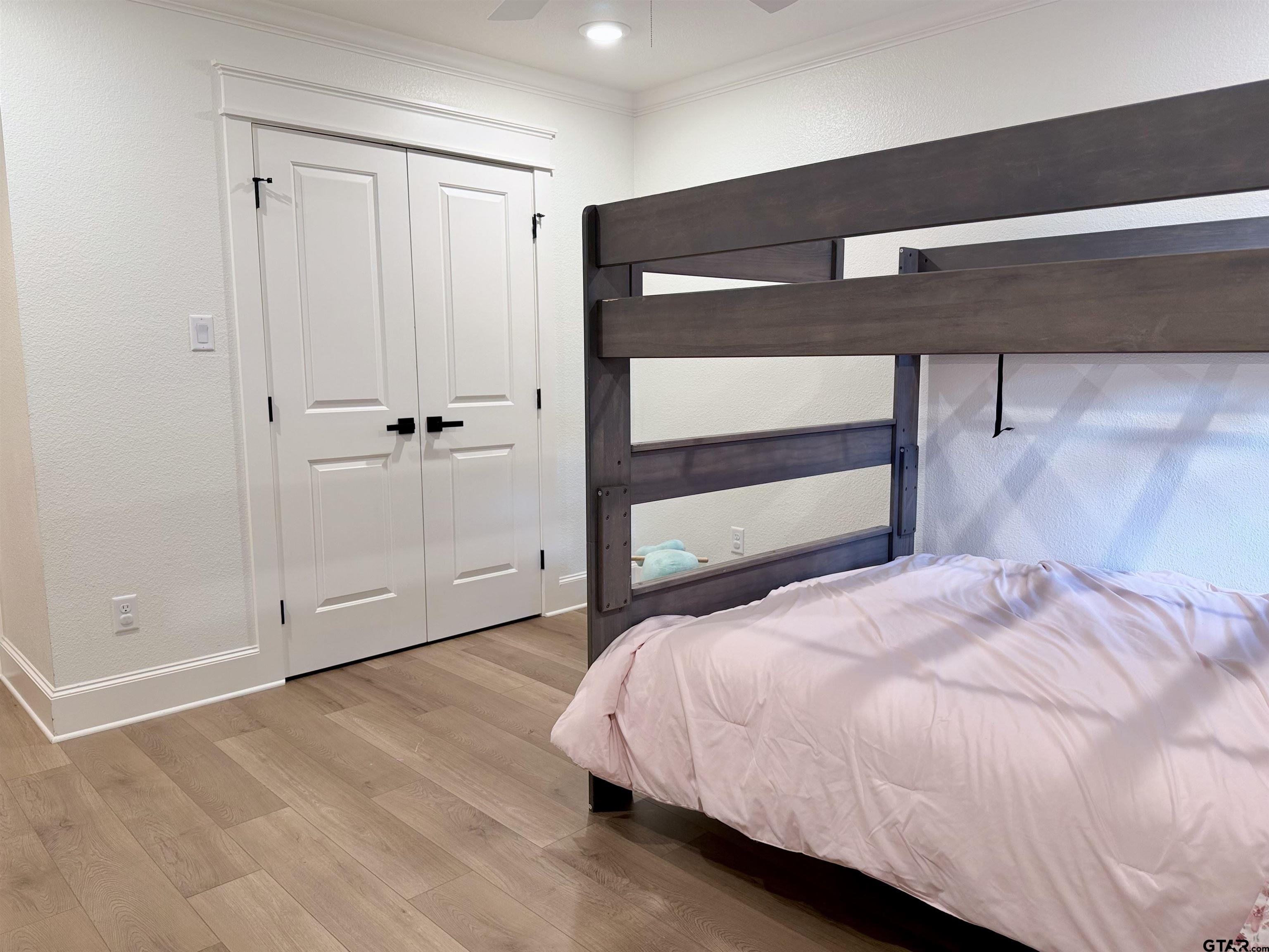 413 Dallas Street Winona, TX 75792 - Photo 29 of 33 a bedroom with a bed and a window