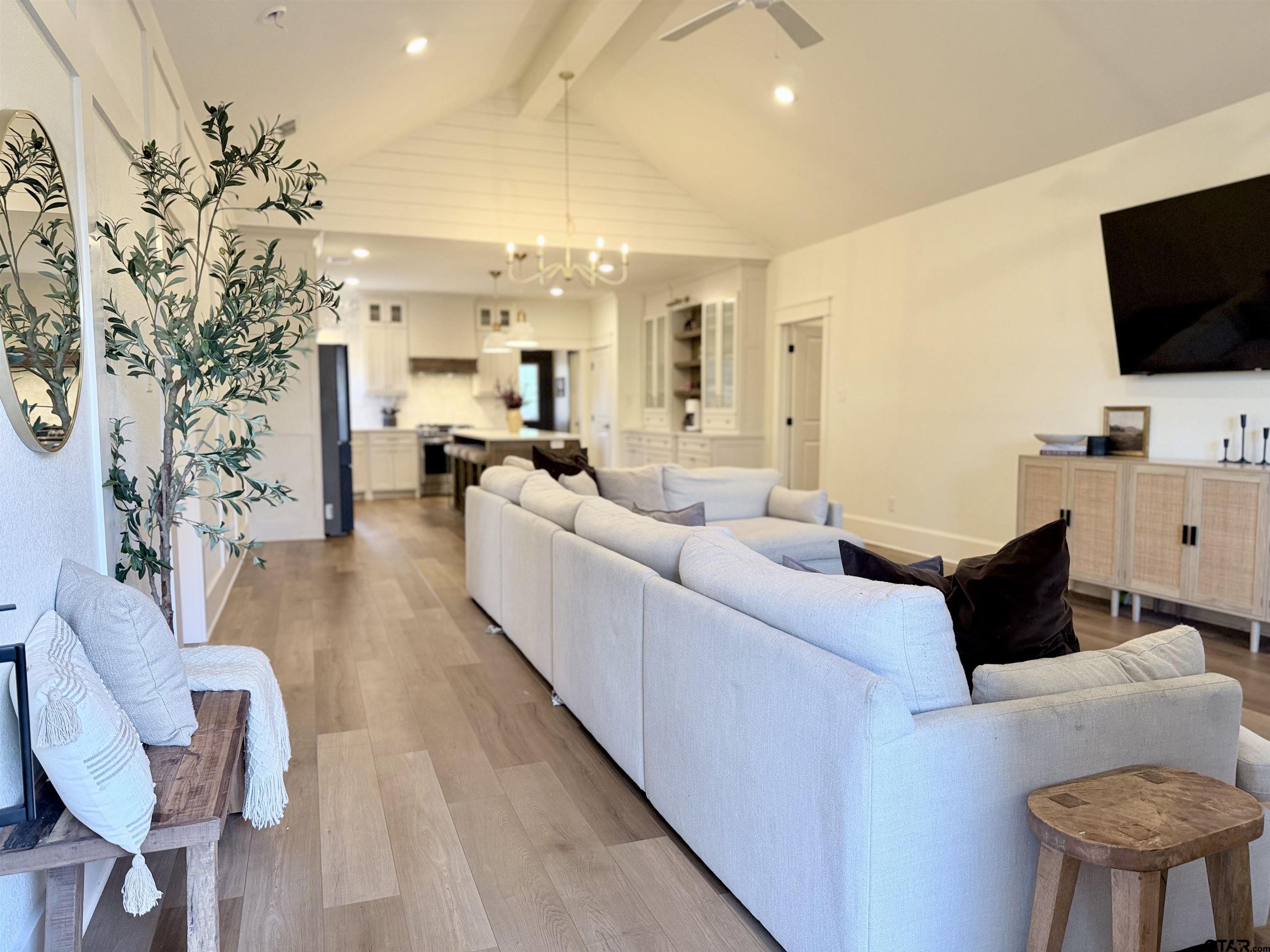 413 Dallas Street Winona, TX 75792 - Photo 10 of 33 a living room with furniture and a flat screen tv