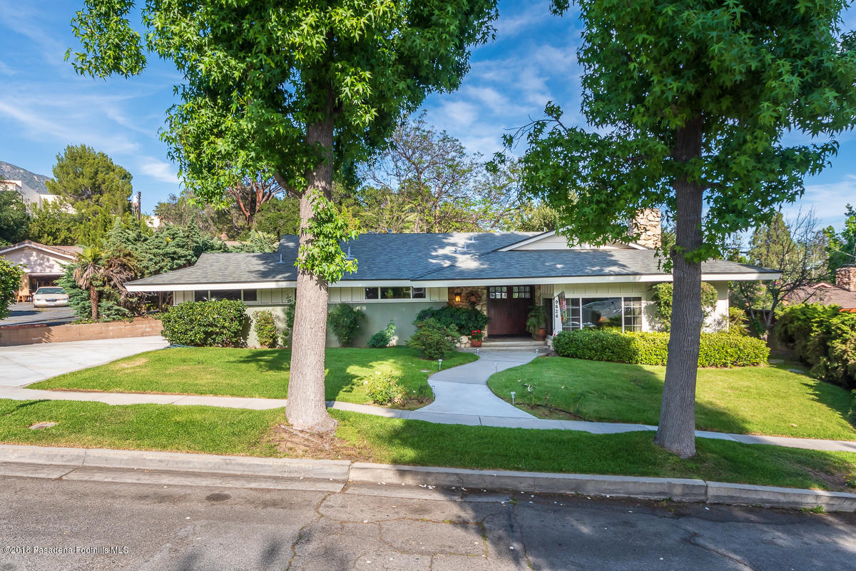 9624 Creemore Drive Tujunga, CA 91042 - Photo 2 of 56 a front view of house with yard and green space