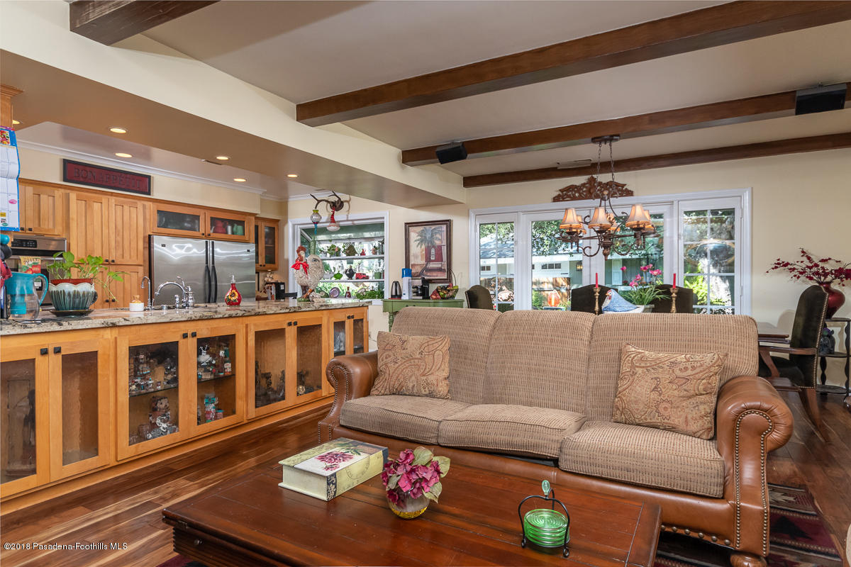 9624 Creemore Drive Tujunga, CA 91042 - Photo 14 of 56 a living room with furniture kitchen and a window