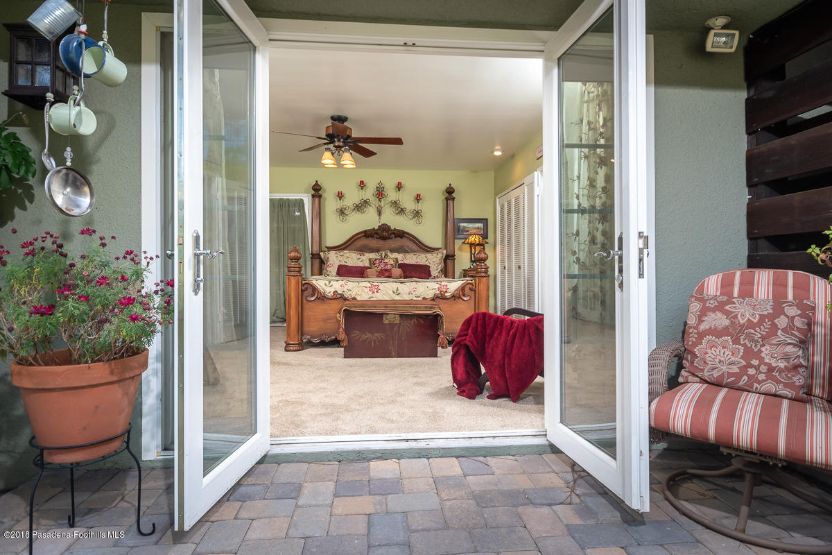 9624 Creemore Drive Tujunga, CA 91042 - Photo 24 of 56 a view of living room filled with furniture and a potted plant