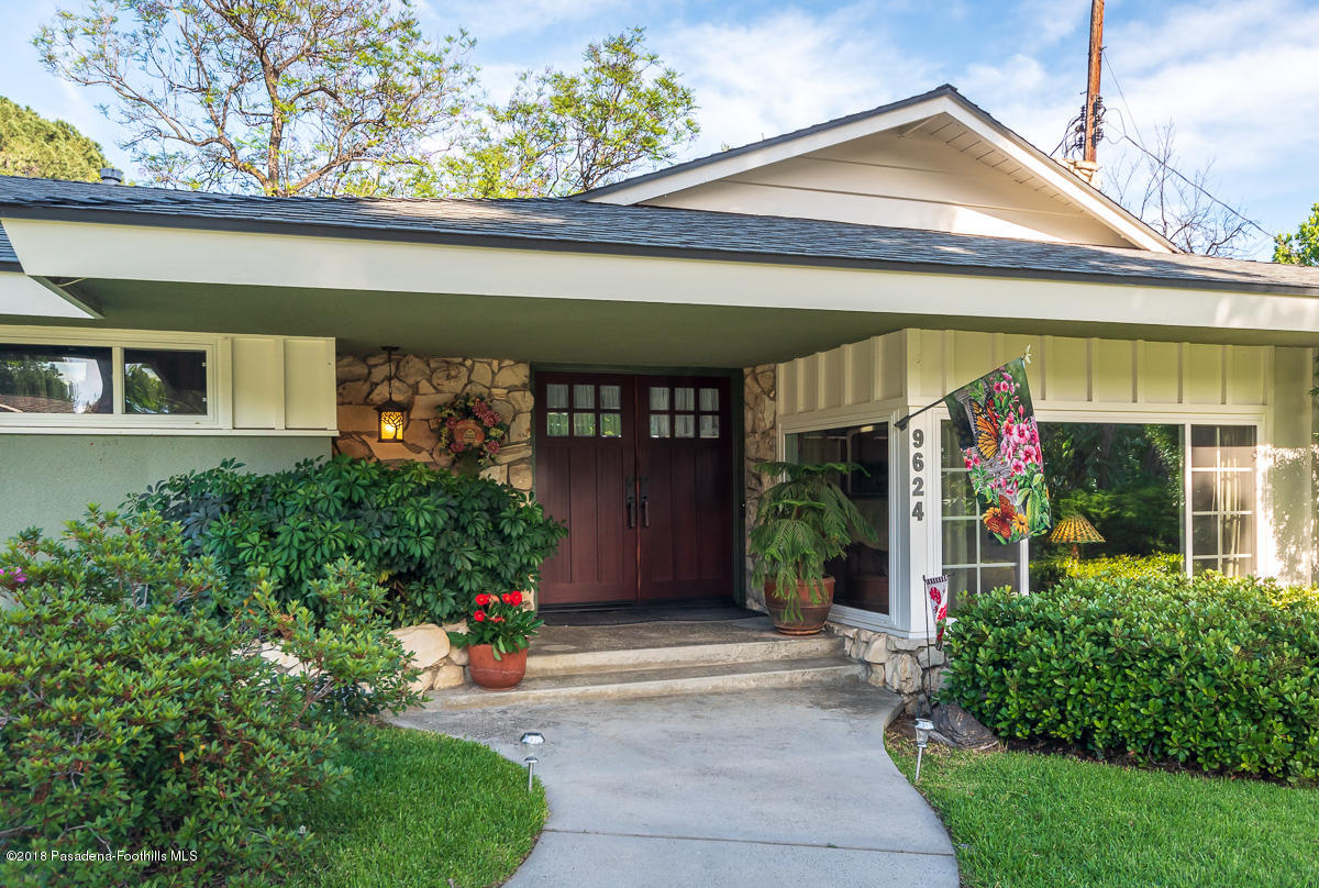 9624 Creemore Drive Tujunga, CA 91042 - Photo 4 of 56 front view of a house with an outdoor seating