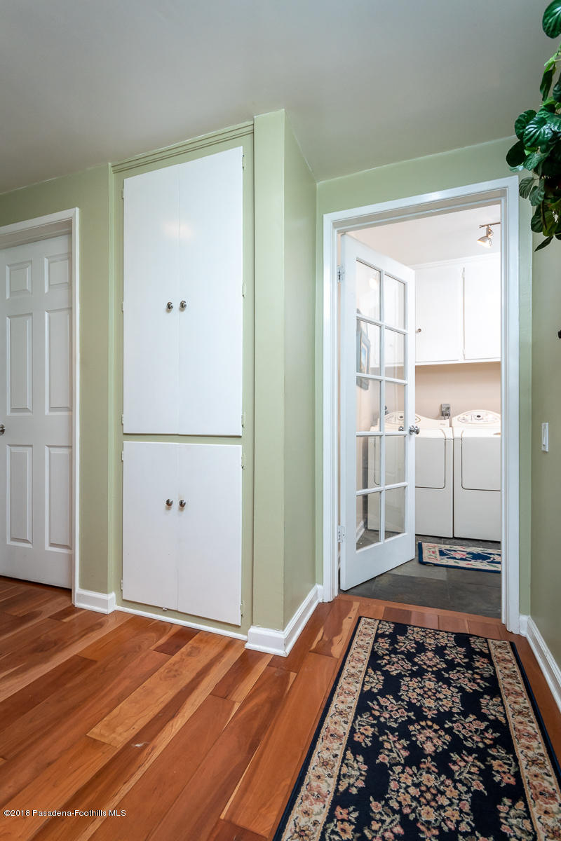 9624 Creemore Drive Tujunga, CA 91042 - Photo 37 of 56 a bedroom with wooden floor and a rug