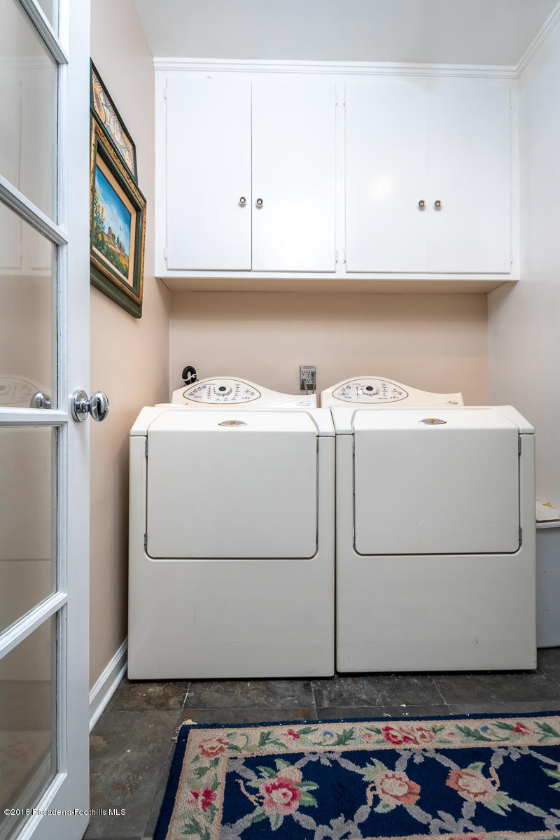 9624 Creemore Drive Tujunga, CA 91042 - Photo 38 of 56 a utility room with dryer and washer