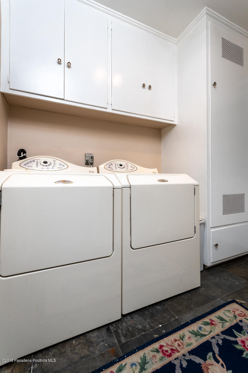 9624 Creemore Drive Tujunga, CA 91042 - Photo 39 of 56 a utility room with dryer and washer