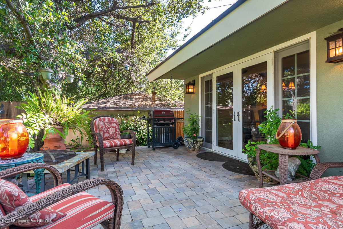 9624 Creemore Drive Tujunga, CA 91042 - Photo 41 of 56 an outdoor sitting area with furniture and garden view