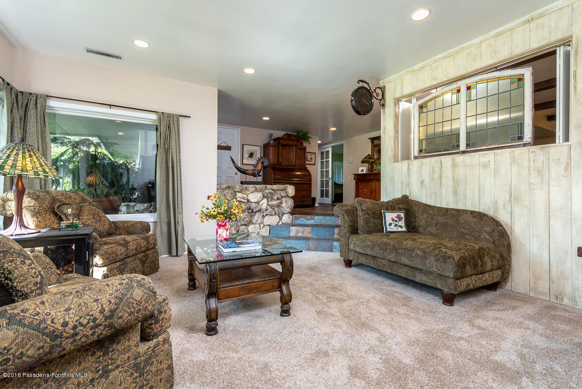 9624 Creemore Drive Tujunga, CA 91042 - Photo 8 of 56 a living room with furniture and a potted plant