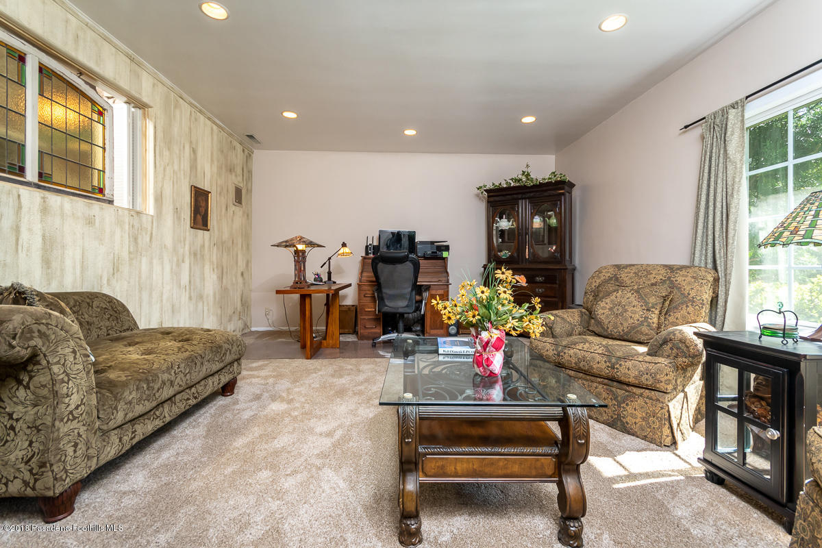 9624 Creemore Drive Tujunga, CA 91042 - Photo 9 of 56 a living room with furniture and a potted plant