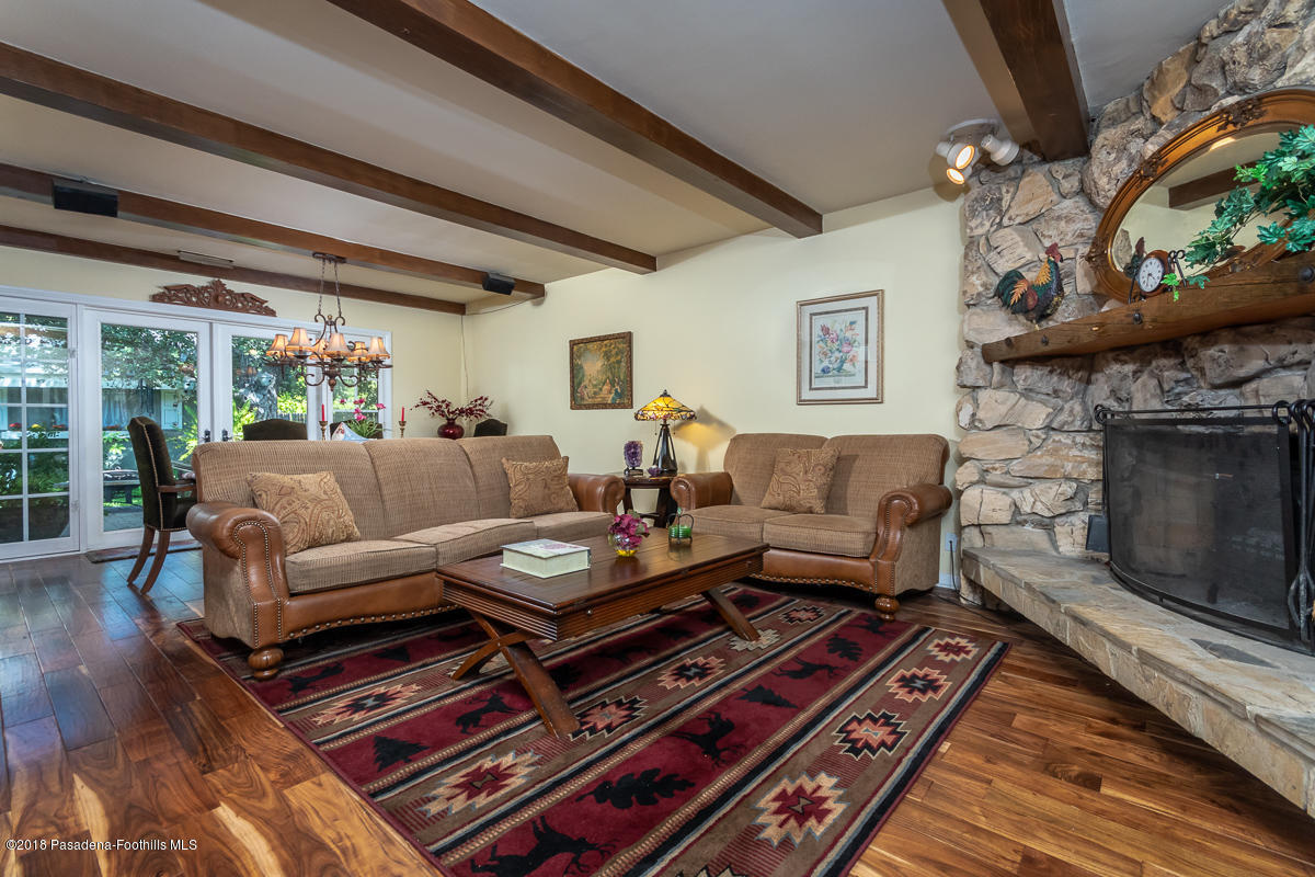 9624 Creemore Drive Tujunga, CA 91042 - Photo 10 of 56 a living room with furniture and a fireplace