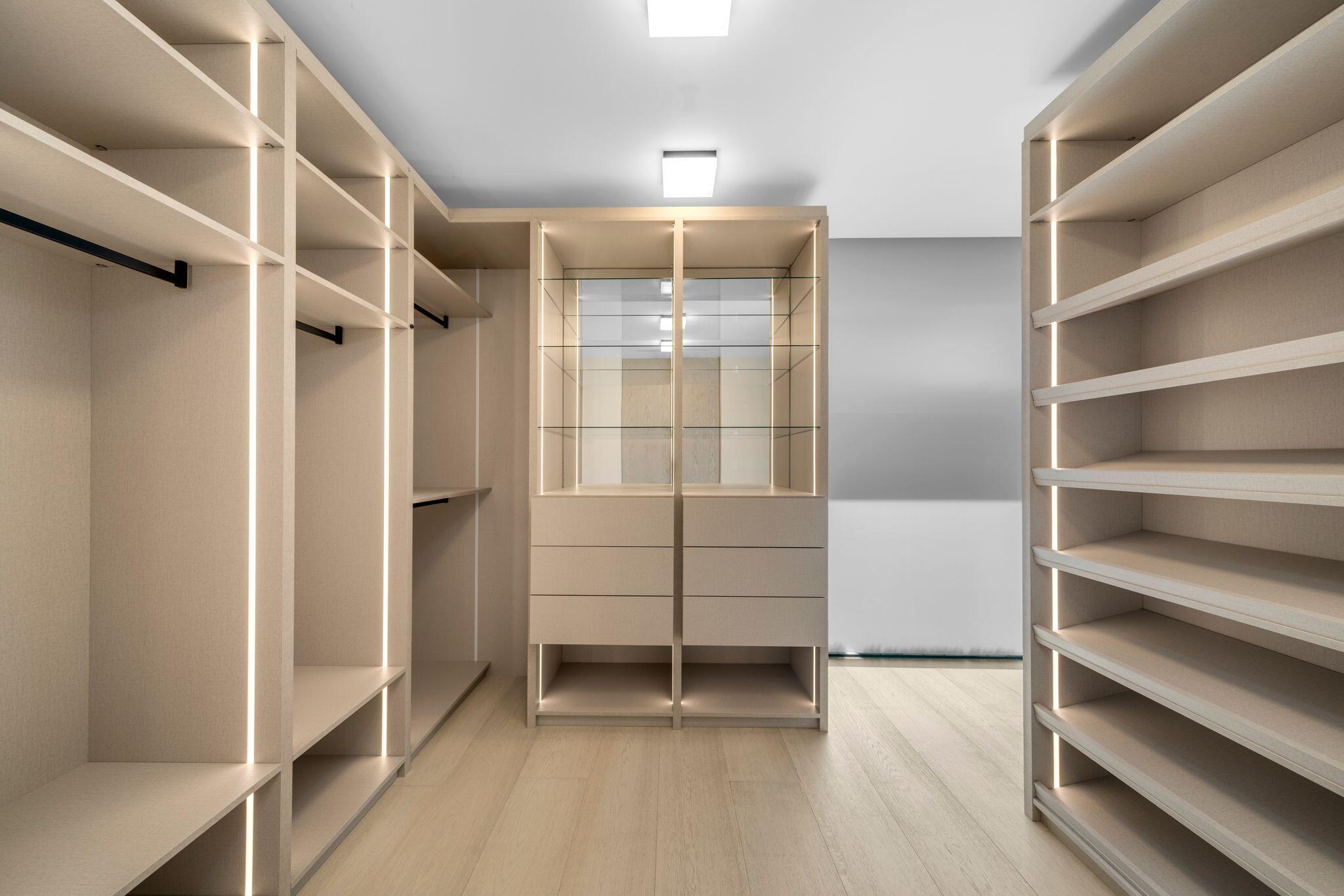 8955 Collins Avenue, Unit LPH Surfside, FL 33154 - Photo 23 of 40 a view of an empty walk in closet