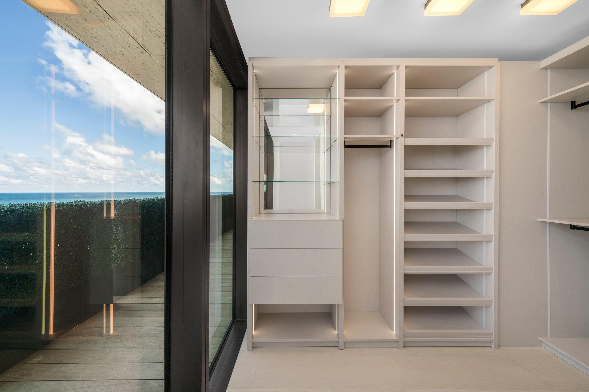 8955 Collins Avenue, Unit LPH Surfside, FL 33154 - Photo 24 of 40 a view of a walk in closet