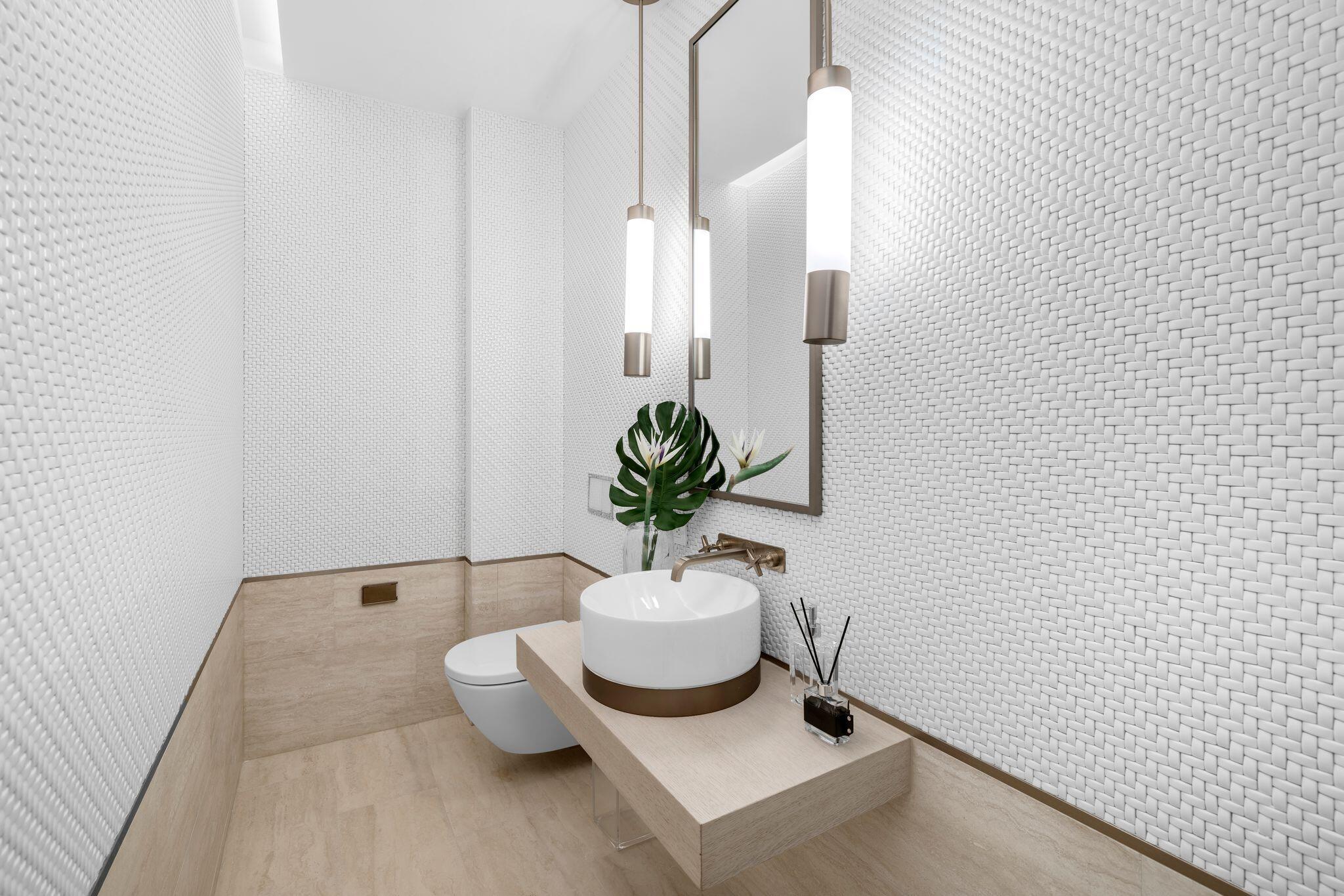 8955 Collins Avenue, Unit LPH Surfside, FL 33154 - Photo 31 of 40 a bathroom with a sink