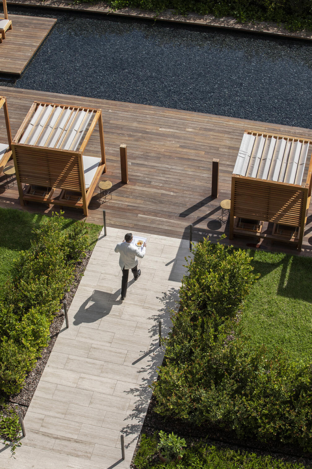 8955 Collins Avenue, Unit LPH Surfside, FL 33154 - Photo 37 of 40 a view of a backyard with sitting area