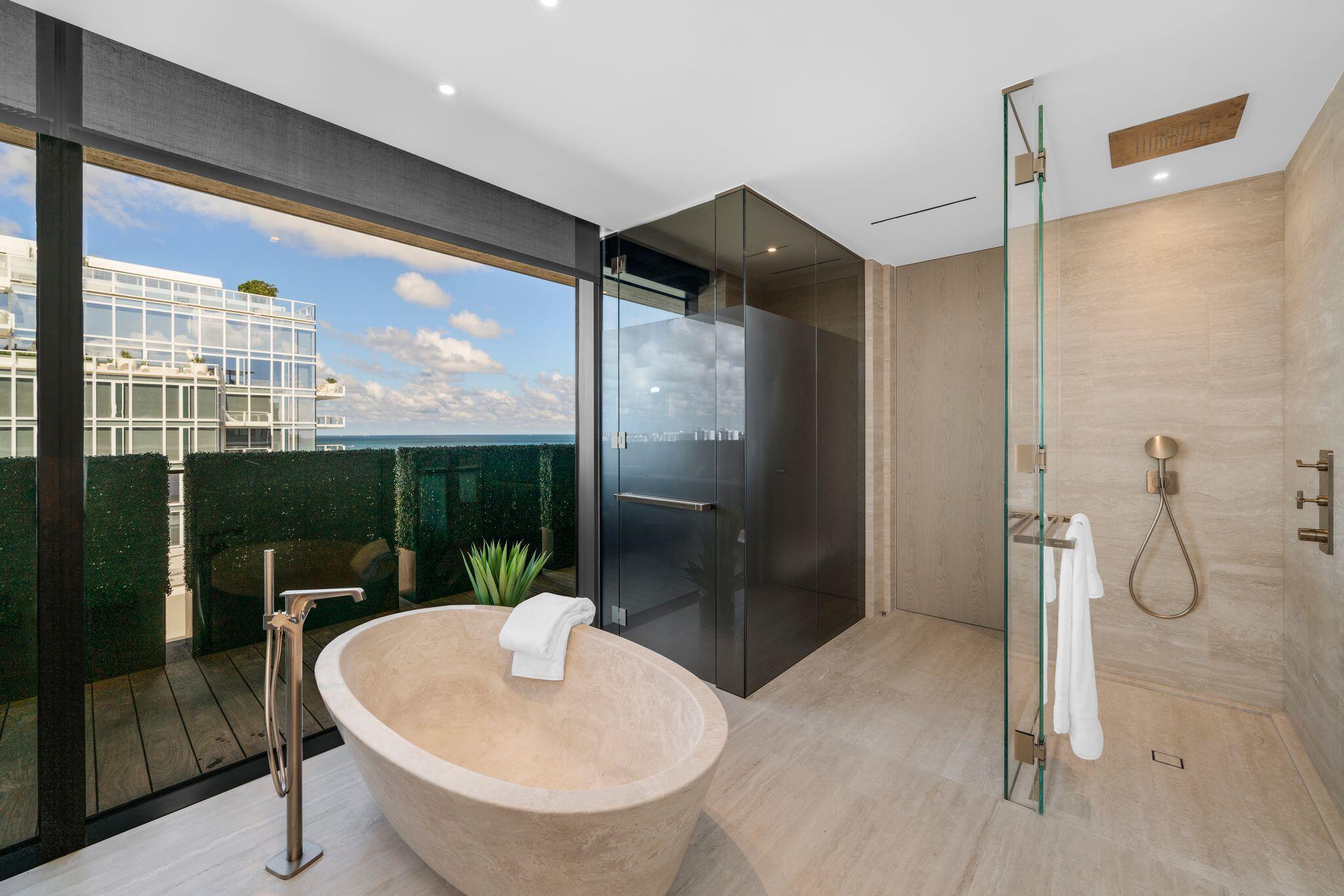 8955 Collins Avenue, Unit LPH Surfside, FL 33154 - Photo 7 of 40 a bathroom with a shower