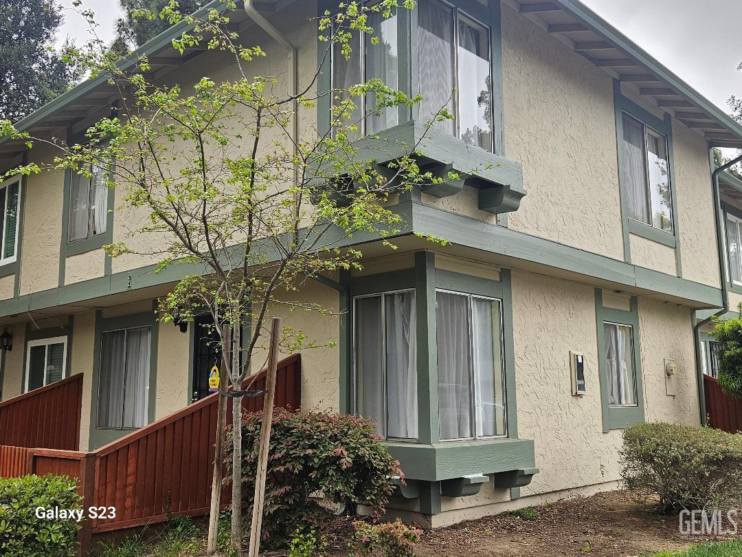 Undisclosed Address San Jose, CA 95111 - Photo 2 of 9 view of a house with a tree