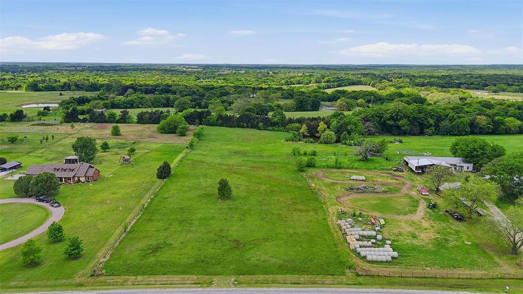 a view of a lush green field