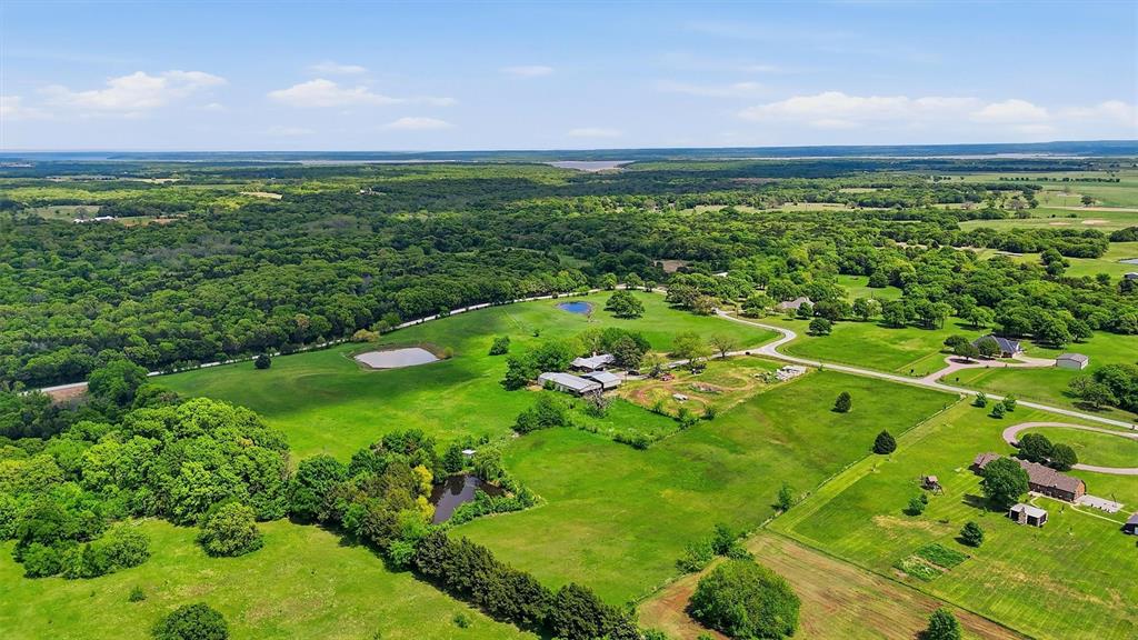 155 Basin Springs Road Sadler, TX 76264 - Photo 11 of 20 a view of a green field